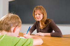 teaching at desk copyright  Marion Wear